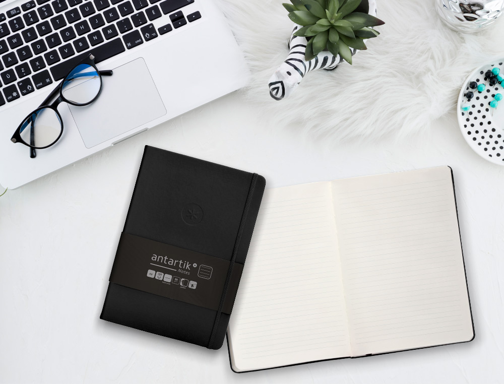 CUADERNO CON GOMILLA ANTARTIK NOTES TAPA DURA A5 HOJAS RAYAS NEGRO 100 HOJAS 80 GR FSC